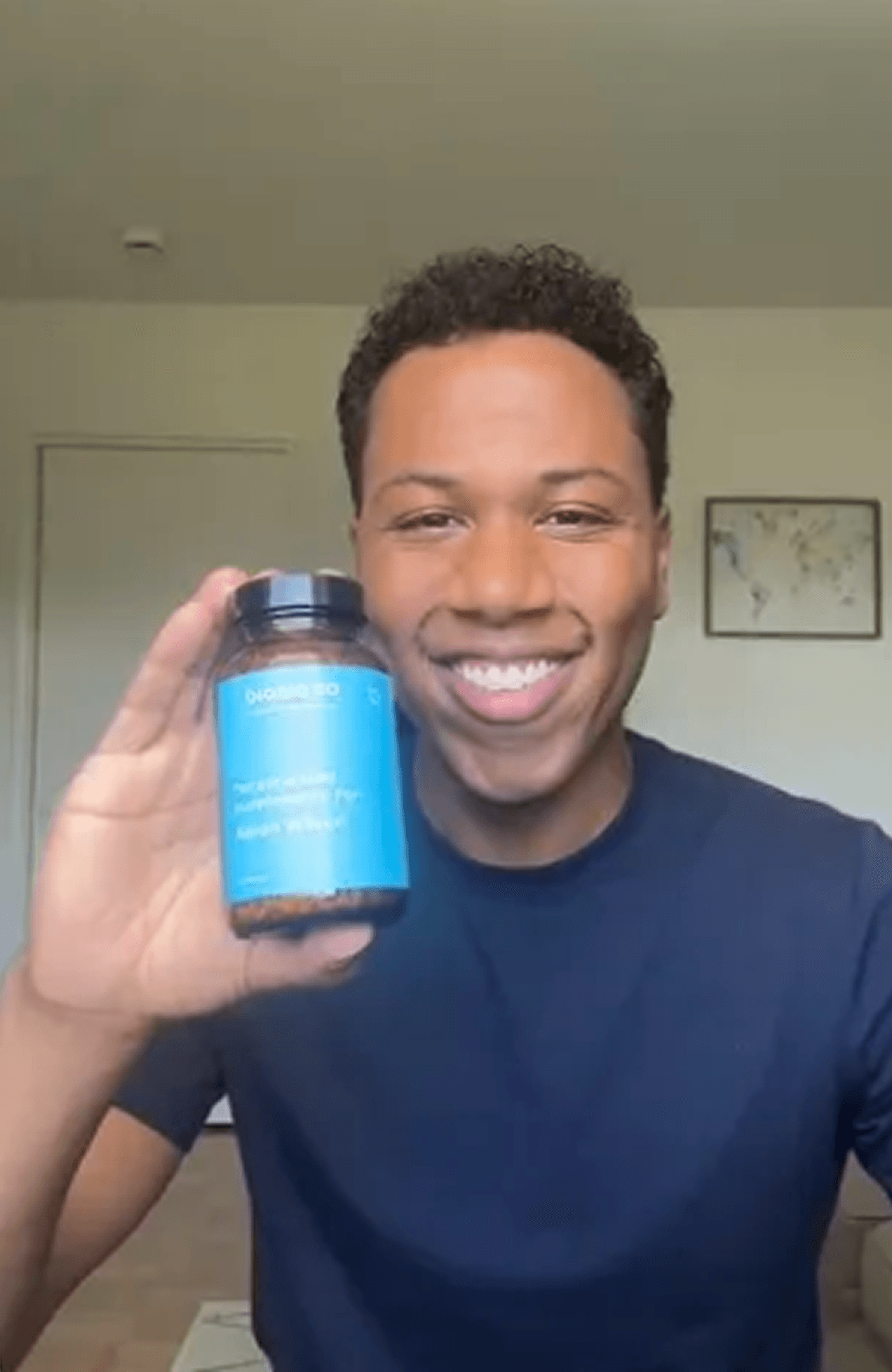 Portrait of Bioniq customer holding Bioniq bottle