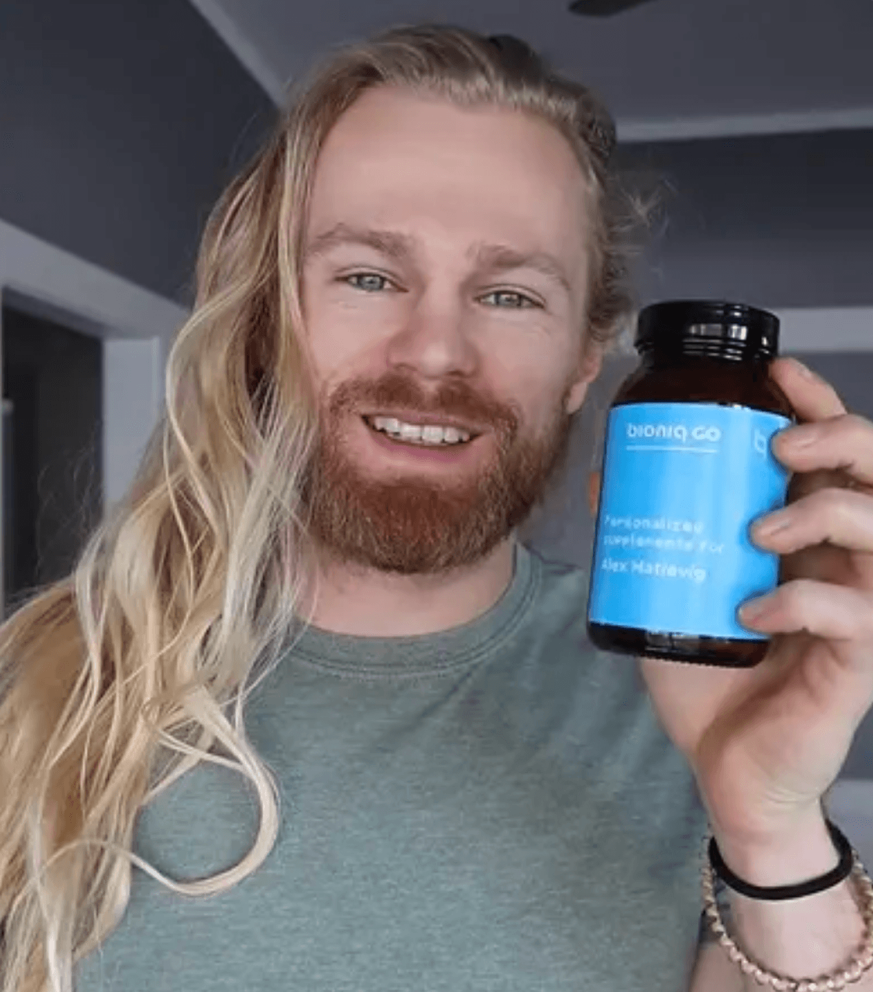 Portrait of customer holding Bioniq bottle